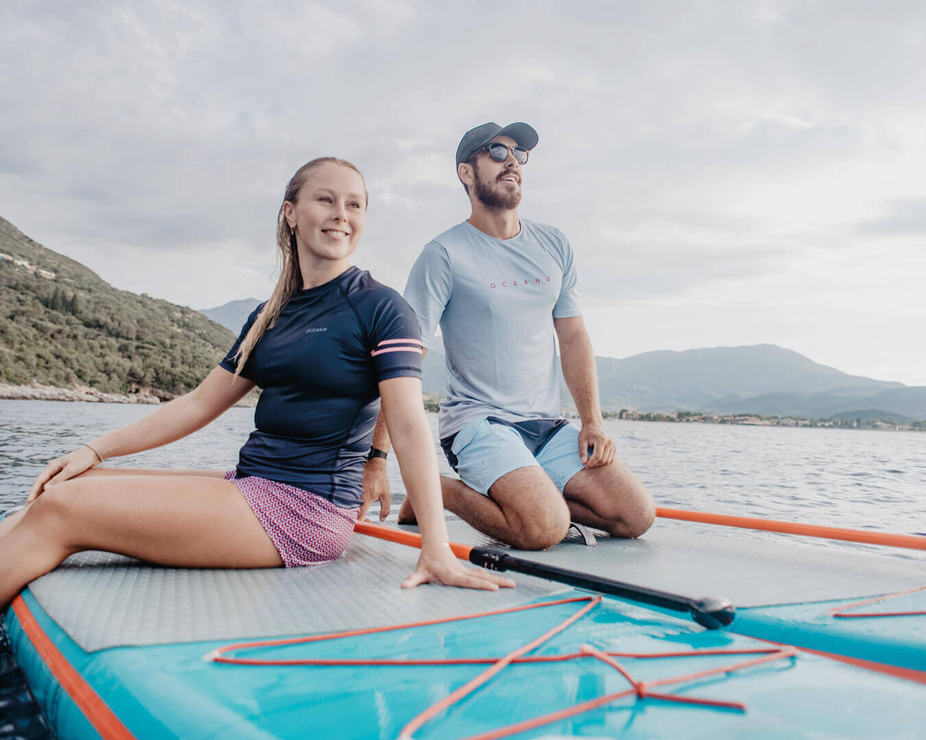Man and Women Wearing Sustainable Custom Tech T-Shirt